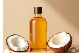 Óleo Corporal Nutritivo de Coco: frasco âmbar com óleo dourado rodeado de pedaços de coco fresco